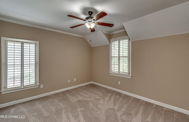 bonus room with light colored carpet and ceiling fan