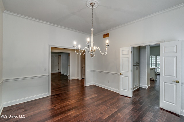 unfurnished dining area with crown molding, a notable chandelier, and dark hardwood / wood-style flooring