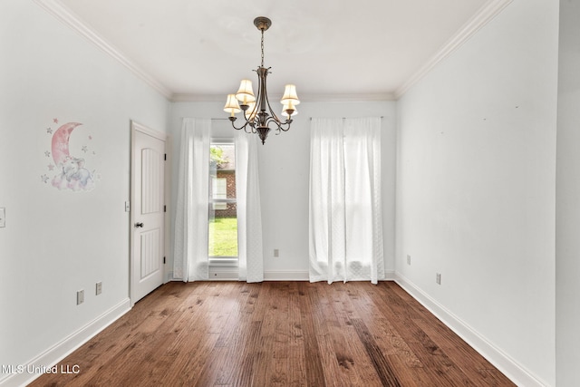 125 Rhodes Ln, Canton, MS 39046 - unfurnished dining area with a chandelier, wood finished floors, baseboards, and crown molding