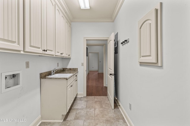 125 Rhodes Ln, Canton, MS 39046 - washroom featuring cabinet space, washer hookup, crown molding, and baseboards