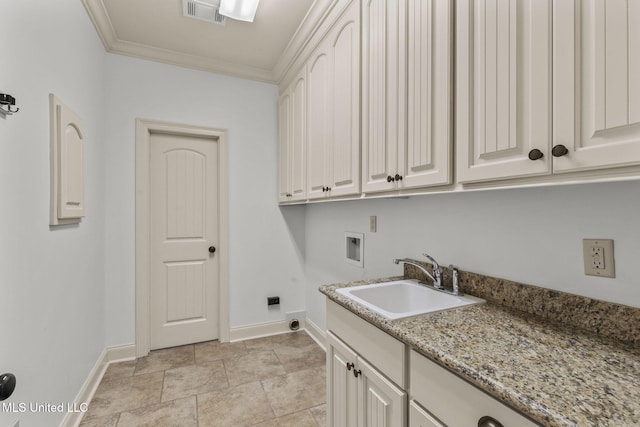 125 Rhodes Ln, Canton, MS 39046 - laundry room featuring washer hookup, baseboards, ornamental molding, and cabinet space