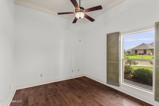 125 Rhodes Ln, Canton, MS 39046 - spare room featuring a ceiling fan, wood finished floors, and baseboards