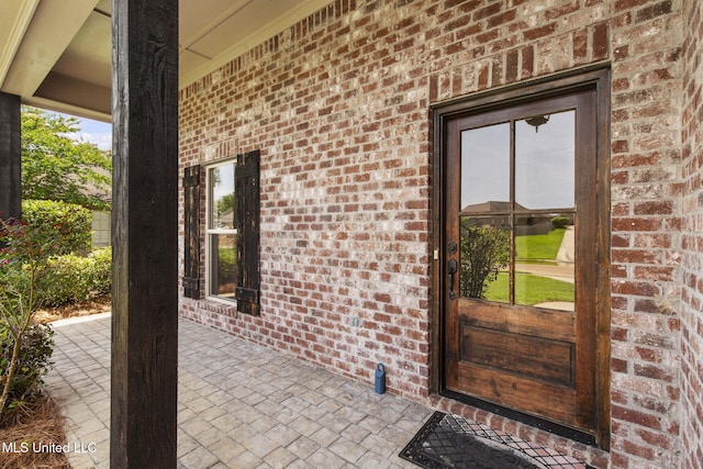 125 Rhodes Ln, Canton, MS 39046 - property entrance featuring brick siding