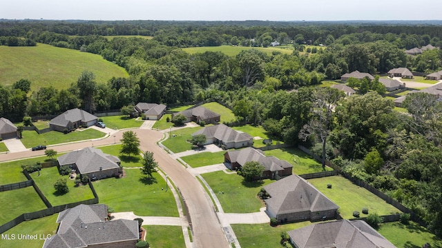 125 Rhodes Ln, Canton, MS 39046 - aerial view of property's location with nearby suburban area and a forest