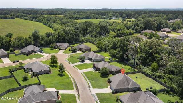 125 Rhodes Ln, Canton, MS 39046 - view of property location with nearby suburban area and a forest