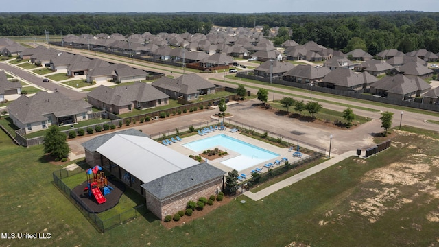 125 Rhodes Ln, Canton, MS 39046 - aerial view of residential area featuring a pool area