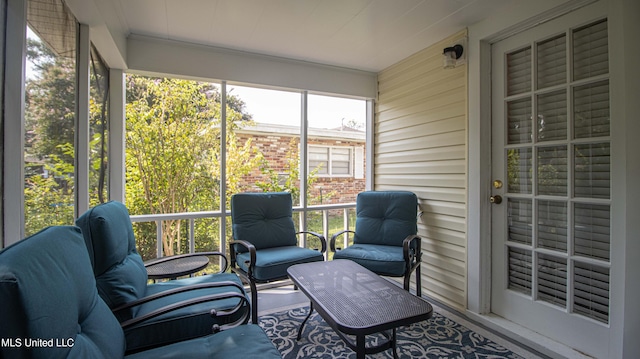 sunroom featuring a healthy amount of sunlight