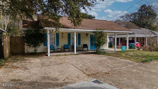 exterior space featuring covered porch