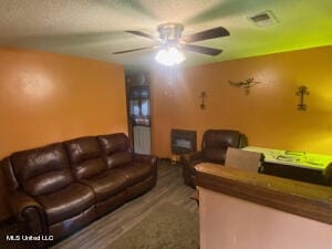 living room featuring ceiling fan