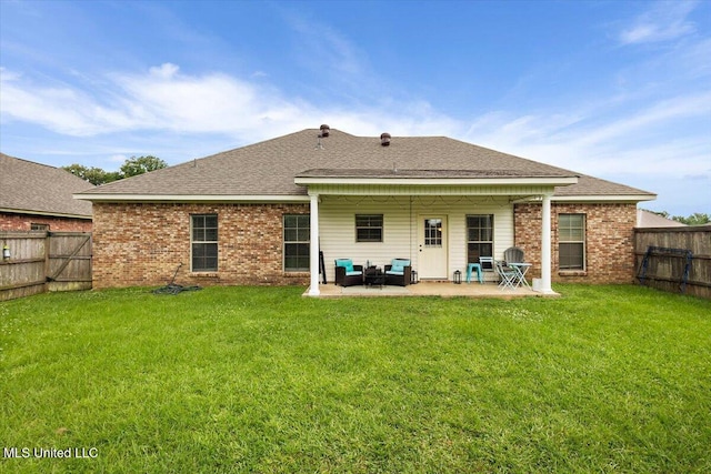 602 Oakview Way, Byram, MS 39272 - back of property featuring a patio, a shingled roof, and brick siding