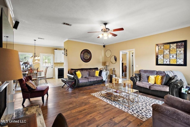 602 Oakview Way, Byram, MS 39272 - living room featuring light wood-style flooring, a ceiling fan, and ornamental molding