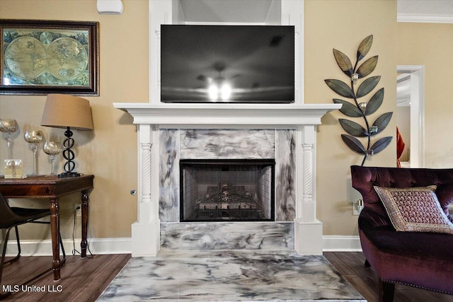 602 Oakview Way, Byram, MS 39272 - detailed view of a fireplace, wood finished floors, baseboards, and crown molding