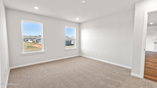 9613 Reserve Blvd, Biloxi, MS 39532 - spare room with carpet floors, plenty of natural light, and recessed lighting