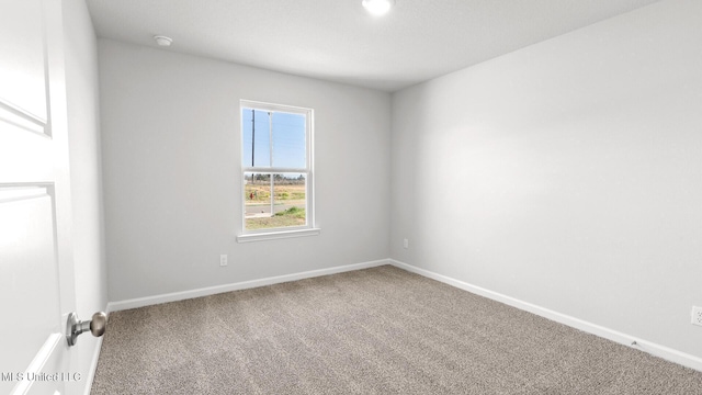 9613 Reserve Blvd, Biloxi, MS 39532 - empty room featuring carpet flooring and baseboards