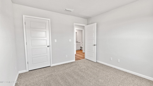 9613 Reserve Blvd, Biloxi, MS 39532 - unfurnished bedroom with carpet floors and baseboards