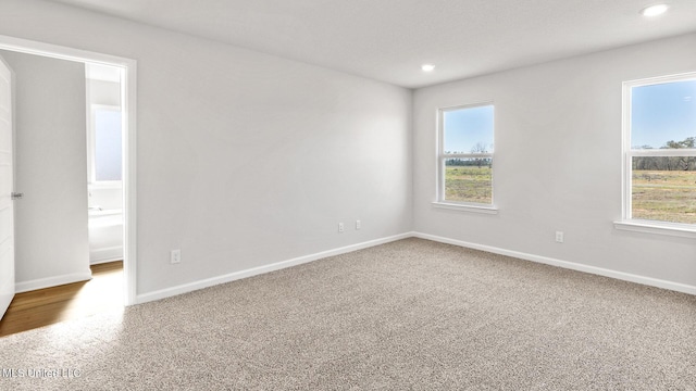 9613 Reserve Blvd, Biloxi, MS 39532 - carpeted spare room featuring plenty of natural light and recessed lighting