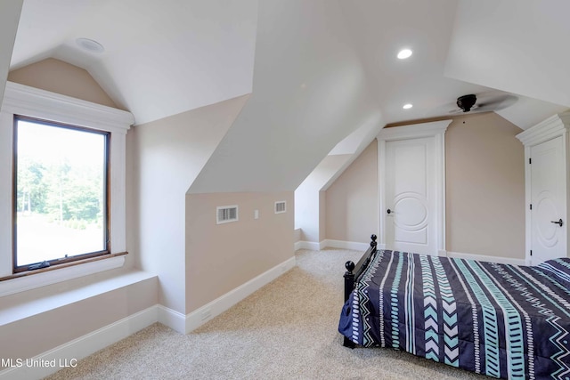 11281 Rd 468, Philadelphia, MS 39350 - unfurnished bedroom featuring vaulted ceiling and carpet flooring