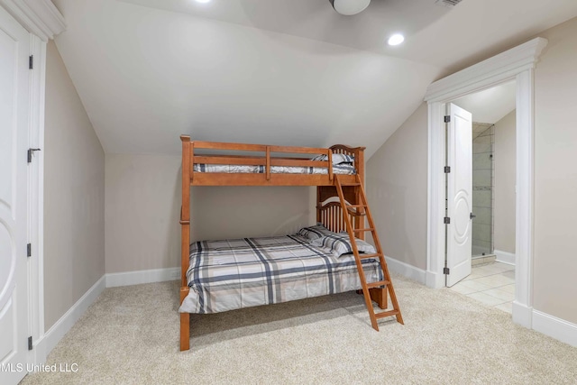 11281 Rd 468, Philadelphia, MS 39350 - bedroom featuring ensuite bathroom, lofted ceiling, and light carpet