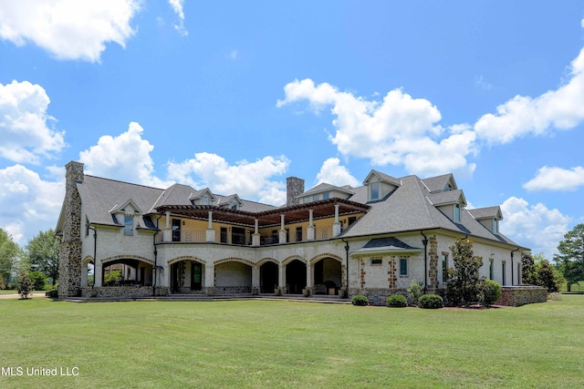 11281 Rd 468, Philadelphia, MS 39350 - back of house featuring a balcony and a lawn