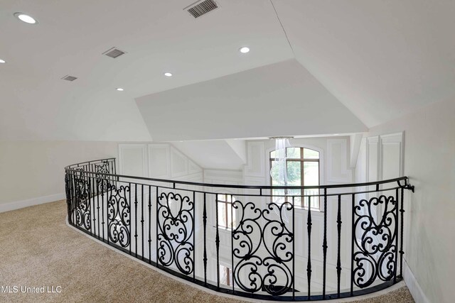 11281 Rd 468, Philadelphia, MS 39350 - corridor with vaulted ceiling and light colored carpet
