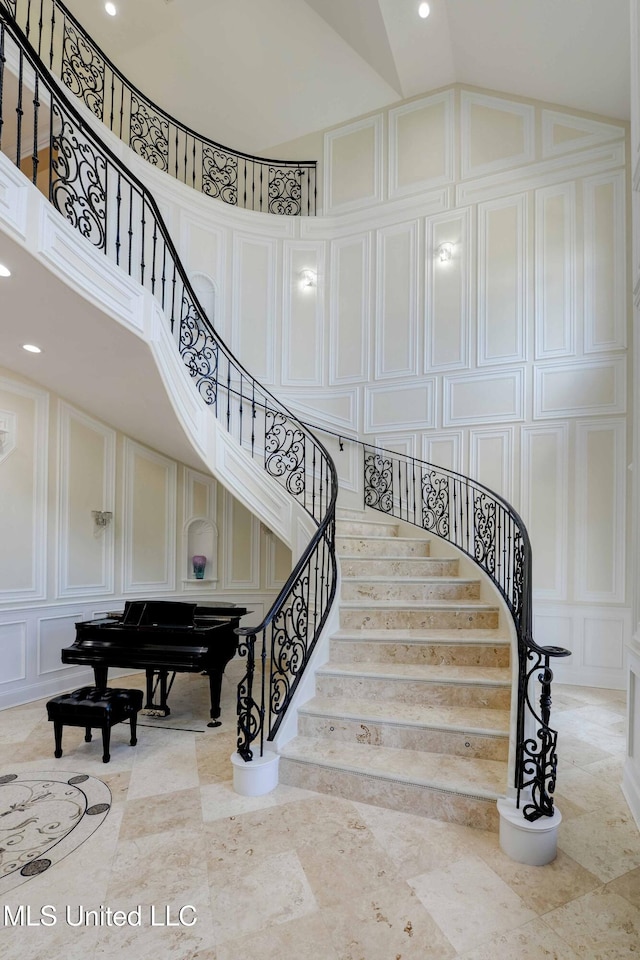 11281 Rd 468, Philadelphia, MS 39350 - staircase with a high ceiling