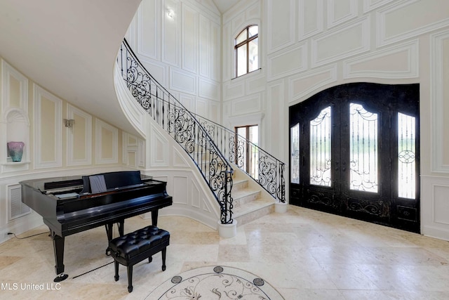 11281 Rd 468, Philadelphia, MS 39350 - foyer entrance with a towering ceiling, french doors, and a healthy amount of sunlight