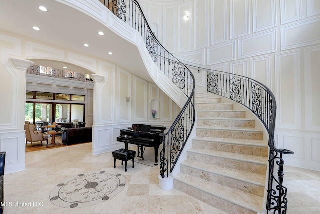 11281 Rd 468, Philadelphia, MS 39350 - stairway with ornate columns and a high ceiling