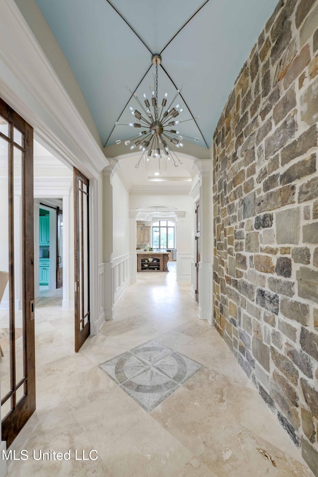 11281 Rd 468, Philadelphia, MS 39350 - hall with vaulted ceiling, ornamental molding, and an inviting chandelier