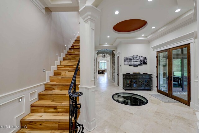 11281 Rd 468, Philadelphia, MS 39350 - foyer entrance with ornate columns, ornamental molding, and french doors
