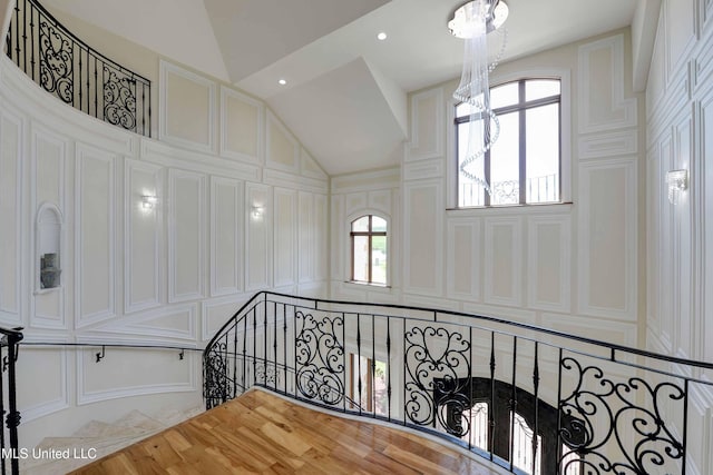 11281 Rd 468, Philadelphia, MS 39350 - stairs featuring lofted ceiling and a notable chandelier