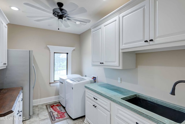 11281 Rd 468, Philadelphia, MS 39350 - laundry area with separate washer and dryer, sink, cabinets, and ceiling fan