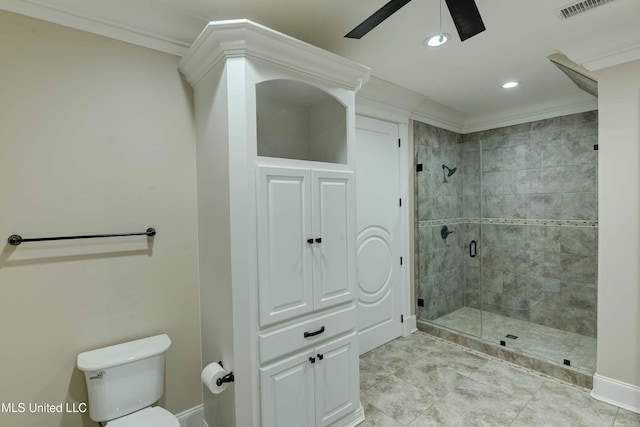 11281 Rd 468, Philadelphia, MS 39350 - bathroom with ceiling fan, ornamental molding, toilet, and an enclosed shower