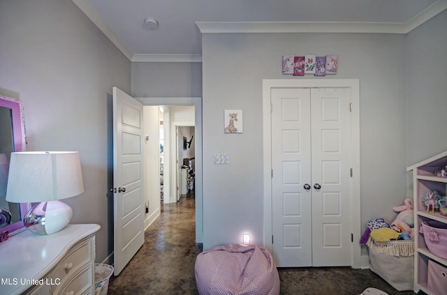 interior space with crown molding, finished concrete floors, and a closet