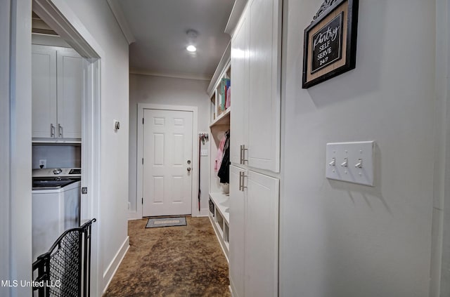 mudroom with ornamental molding, washer / clothes dryer, and baseboards