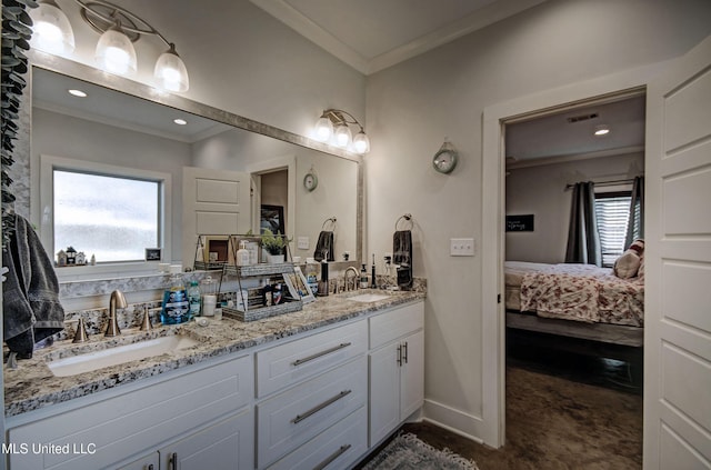 full bathroom with ornamental molding, ensuite bath, a sink, and visible vents