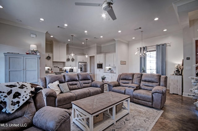 living room with baseboards, visible vents, ornamental molding, concrete flooring, and recessed lighting