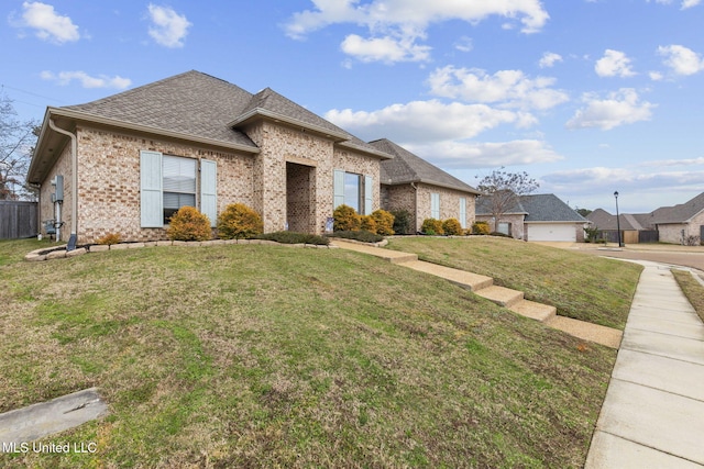 view of front of property with a front lawn