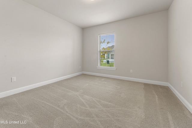 unfurnished room with carpet