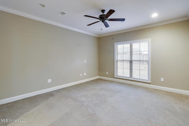 unfurnished room with ceiling fan, ornamental molding, and light carpet