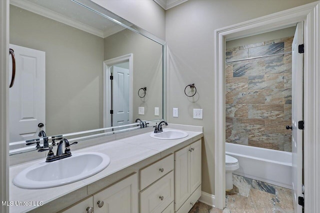 full bathroom featuring vanity, toilet, ornamental molding, and tiled shower / bath