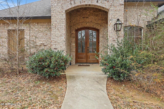 property entrance featuring french doors