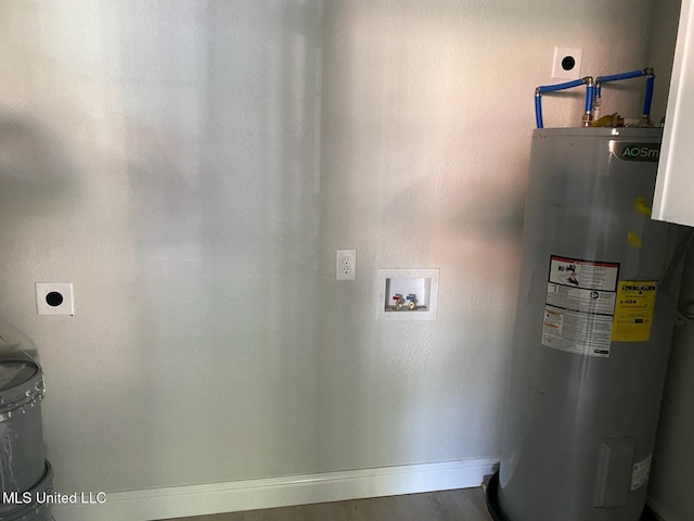 clothes washing area with laundry area, baseboards, electric dryer hookup, washer hookup, and water heater