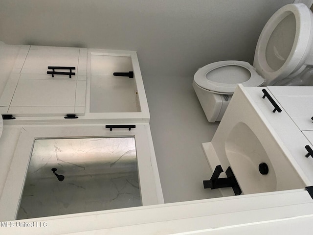 bathroom featuring toilet