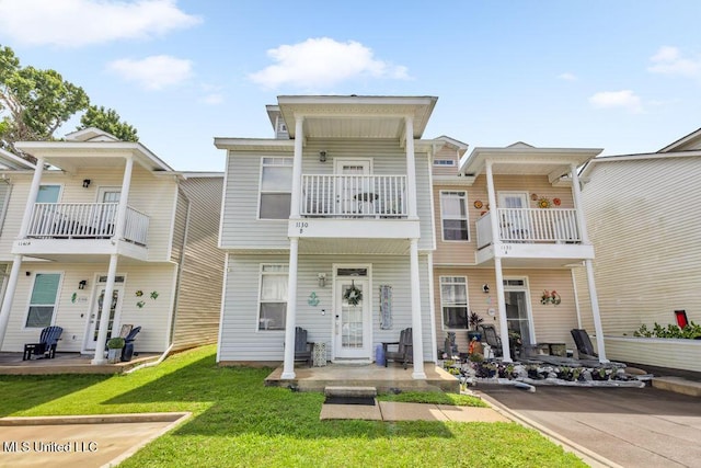 1130 Century Oaks Dr Unit B, Gulfport, MS 39507 - multi unit property with a balcony and a front lawn