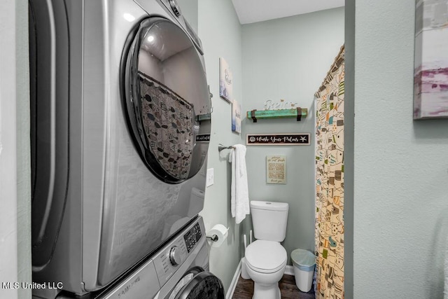 1130 Century Oaks Dr Unit B, Gulfport, MS 39507 - full bathroom with stacked washing machine and dryer and wood finished floors