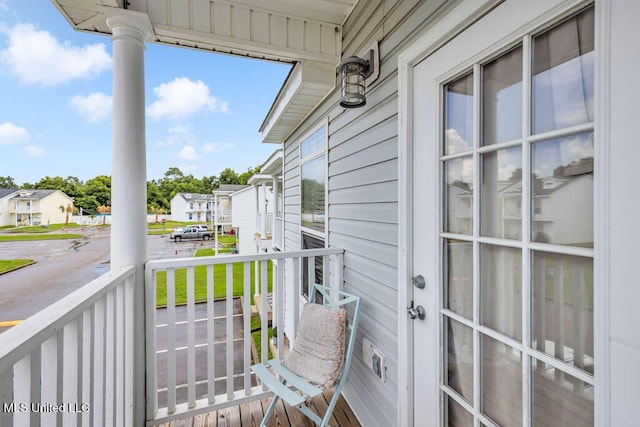 1130 Century Oaks Dr Unit B, Gulfport, MS 39507 - covered porch featuring a residential view