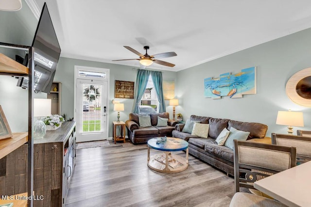 1130 Century Oaks Dr Unit B, Gulfport, MS 39507 - living room with wood finished floors, ceiling fan, and crown molding