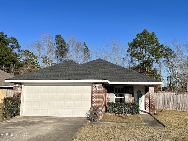 single story home with a garage, a shingled roof, concrete driveway, fence, and brick siding