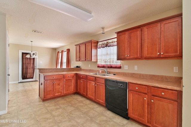 kitchen with a peninsula, a sink, visible vents, black dishwasher, and light floors