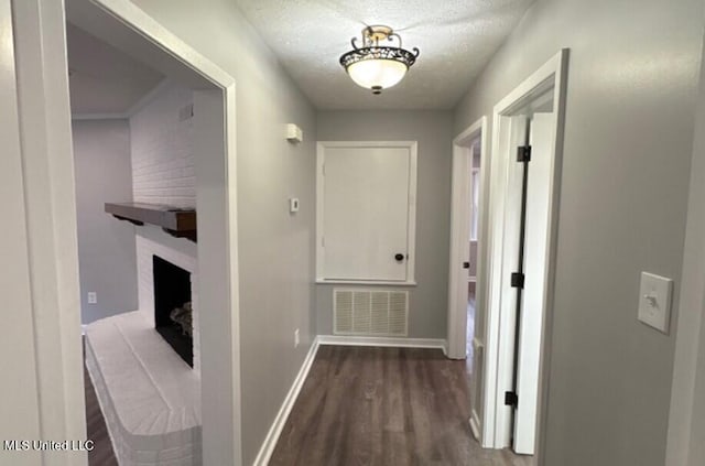 106 Woodcliff Pl, Brandon, MS 39042 - corridor with wood finished floors and a textured ceiling